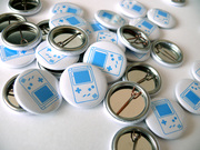 Закатные значки с логотипами. Печать Ваших логотипов для закатных знач